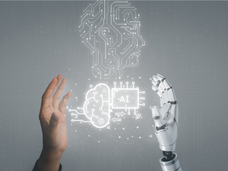 webinar IA applicata all'HR - sfondo grigio, mano umana e di robot, immagini connessioni ia